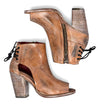 A pair of Angelique ankle boots in tan leather by Bed Stu.