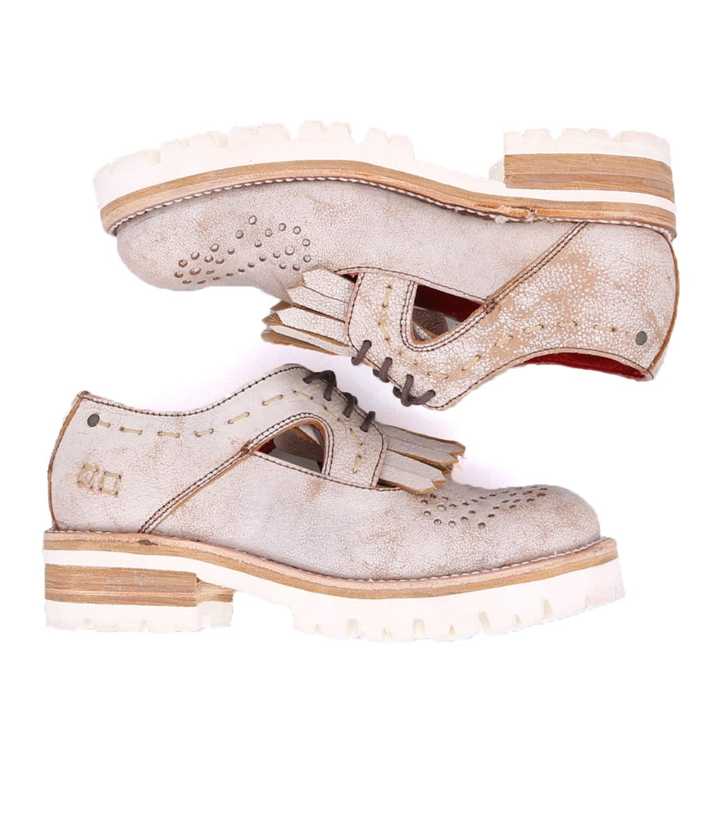 A pair of Anise shoes with white soles and tassels, by Bed Stu.