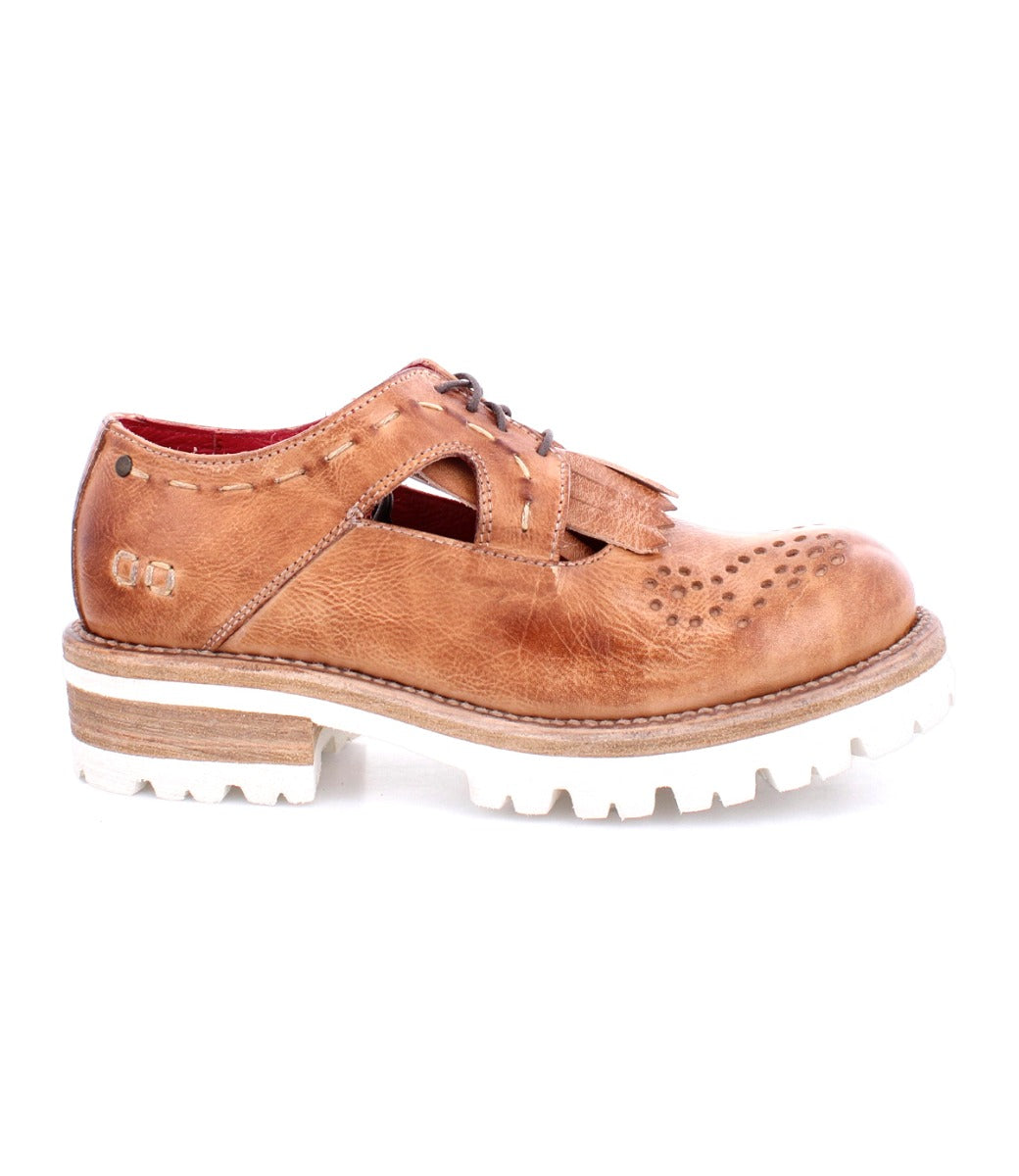 A pair of Anise shoes from Bed Stu with white soles.