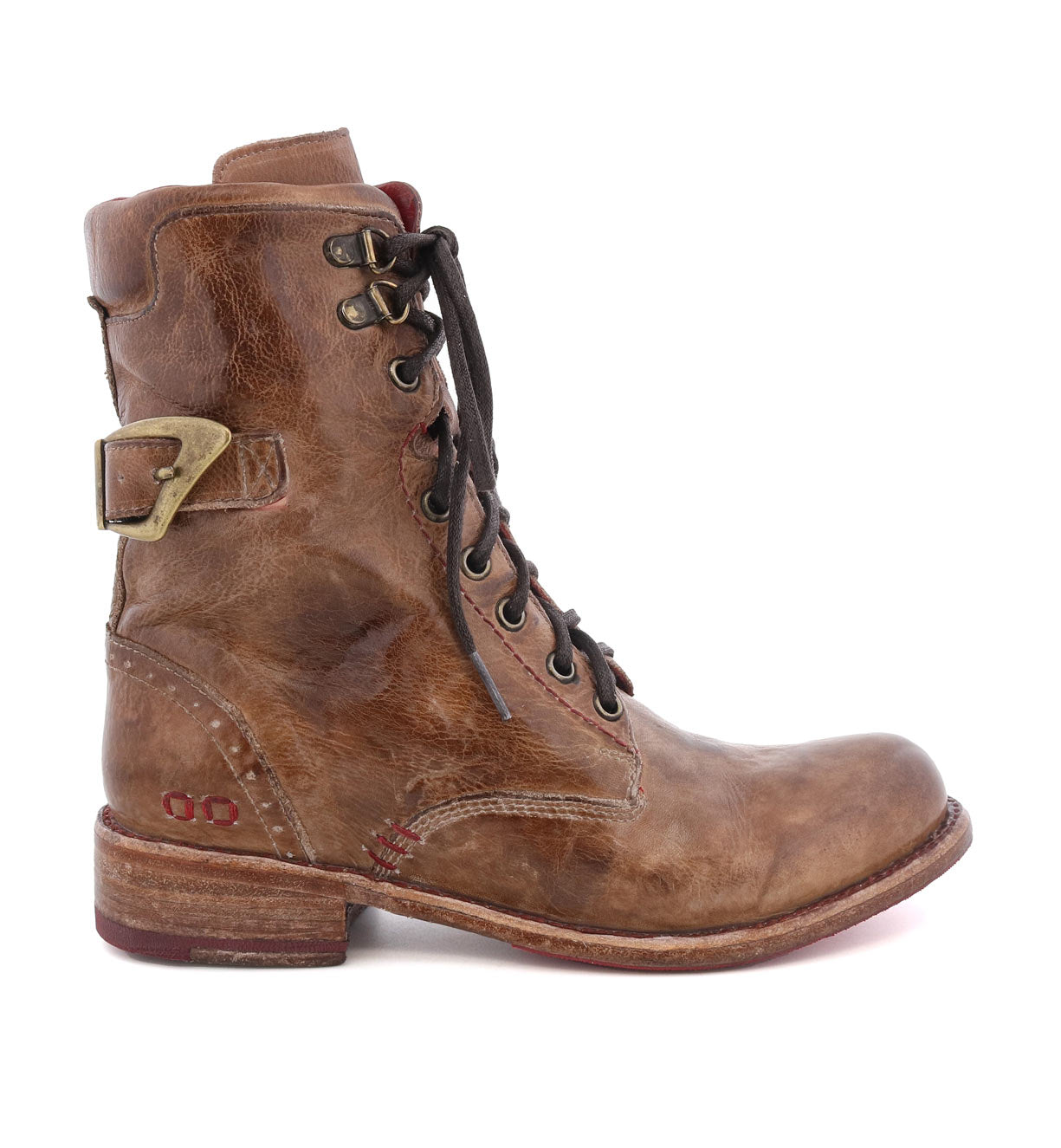 A women's brown leather boot with metal buckles called Anne by Bed Stu.