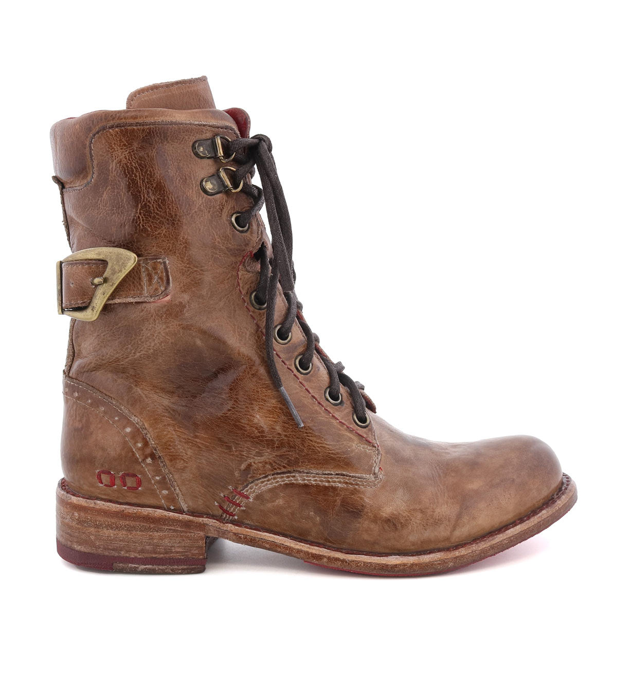 A women's brown leather boot with metal buckles called Anne by Bed Stu.