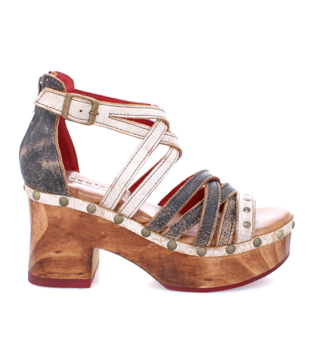 A Antonelli women's sandal with a wooden platform and straps by Bed Stu.