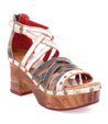 A Bed Stu Antonelli women's sandal with a wooden platform and straps.