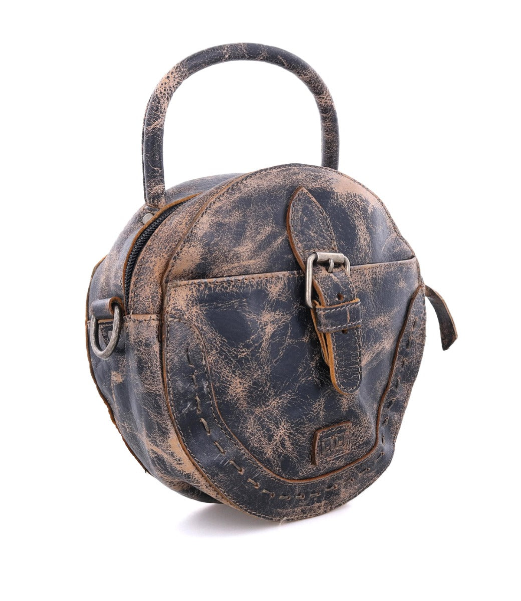 A round brown leather Arenfield bag with a handle by Bed Stu.