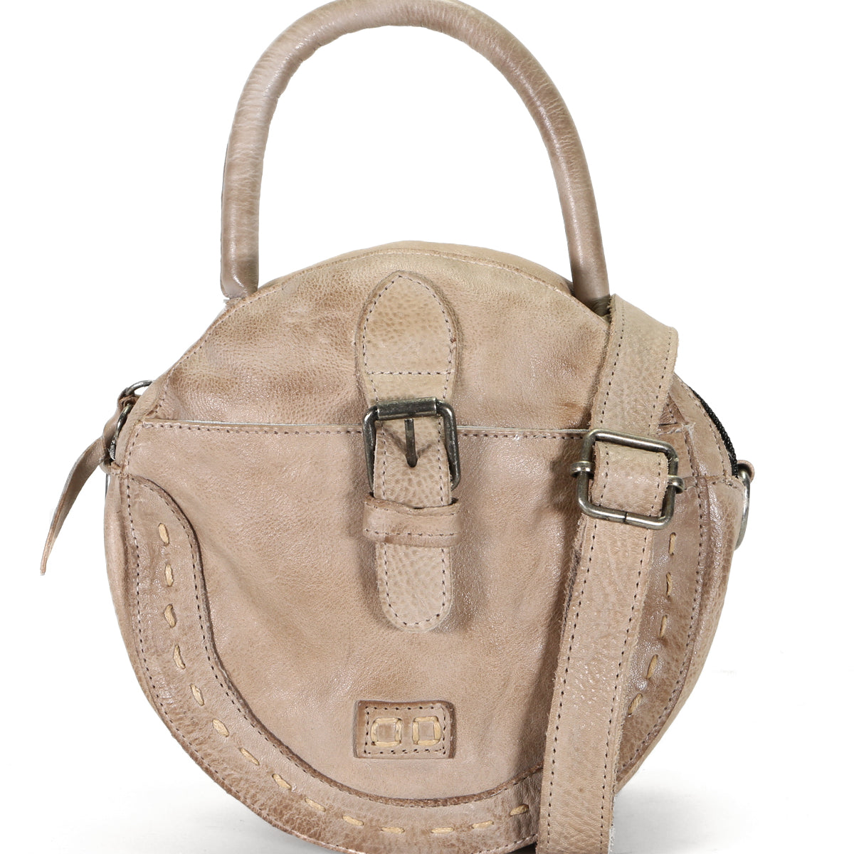 A beige leather Arenfield handbag by Bed Stu with a strap and buckle.