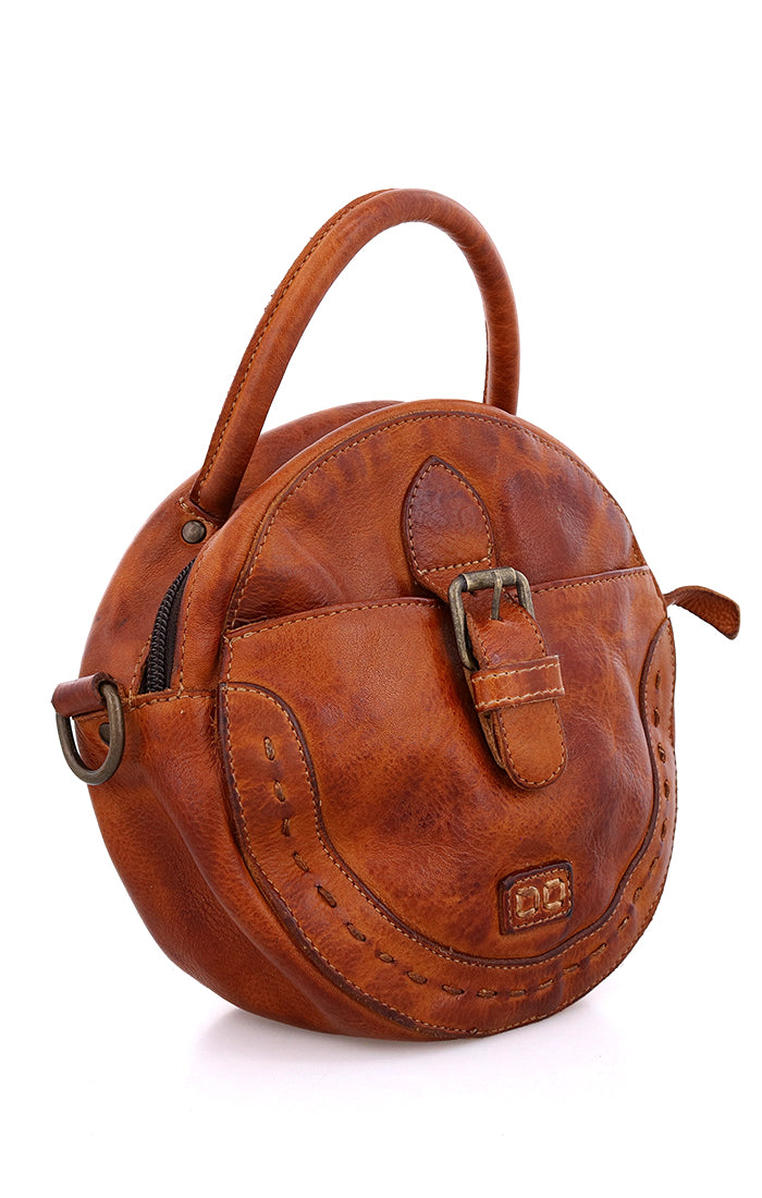 A brown leather Bed Stu Arenfield handbag with a buckle.