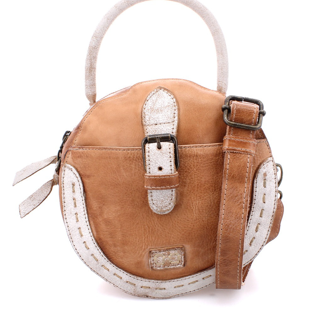 An Arenfield by Bed Stu tan and white leather bag with a strap.