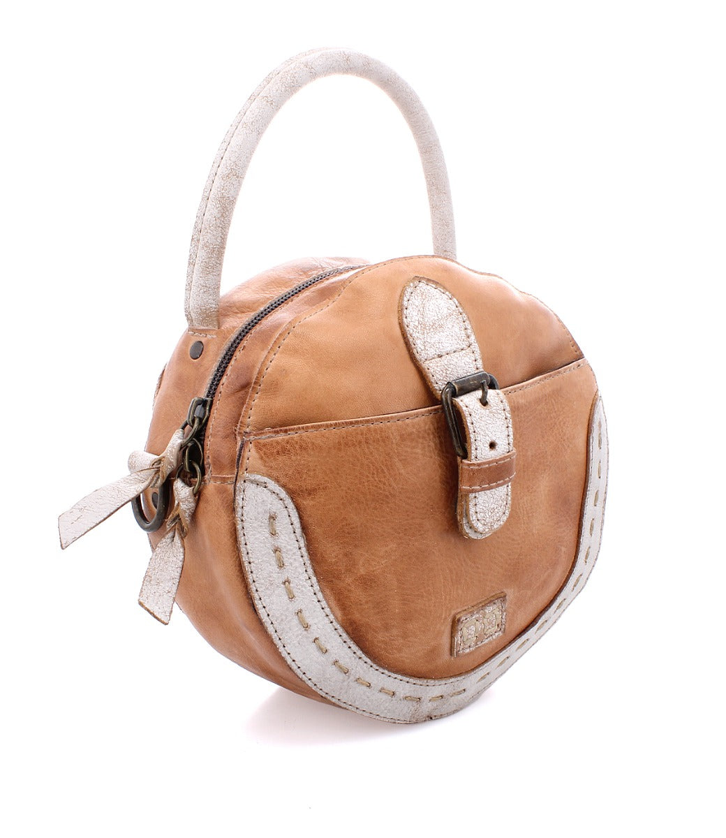 An Arenfield tan and white leather handbag with a strap by Bed Stu.