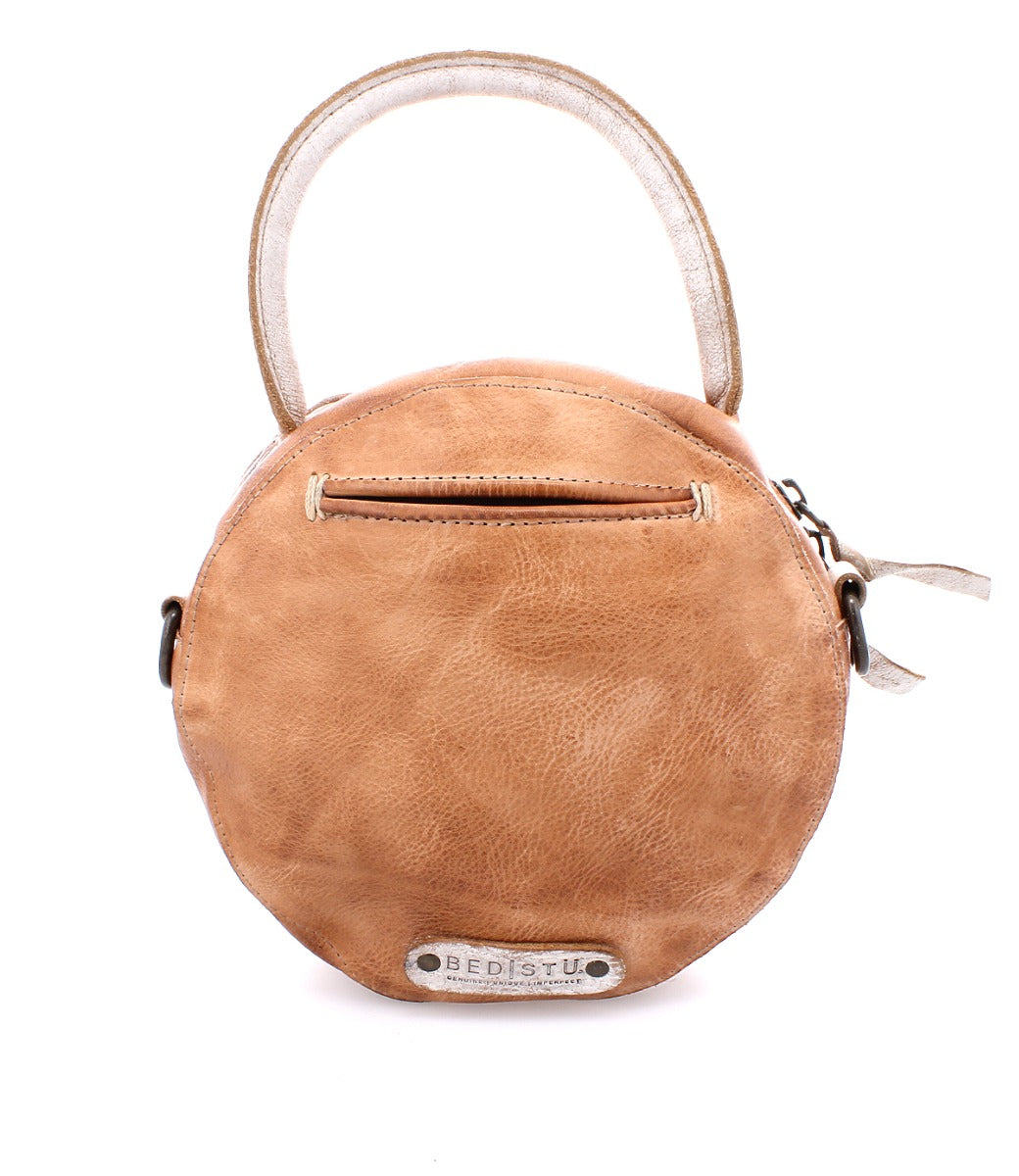 A tan Arenfield handbag from Bed Stu.