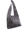 A Bed Stu Ariel hobo bag on a white background.