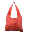 An Ariel red leather hobo bag on a white background from Bed Stu.