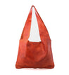 An Ariel leather hobo bag by Bed Stu on a white background.