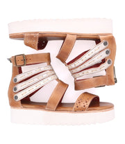 A pair of Artemia sandals with white straps from Bed Stu.