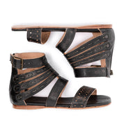 A pair of black Artemis gladiator sandals with straps and buckles by Bed Stu.