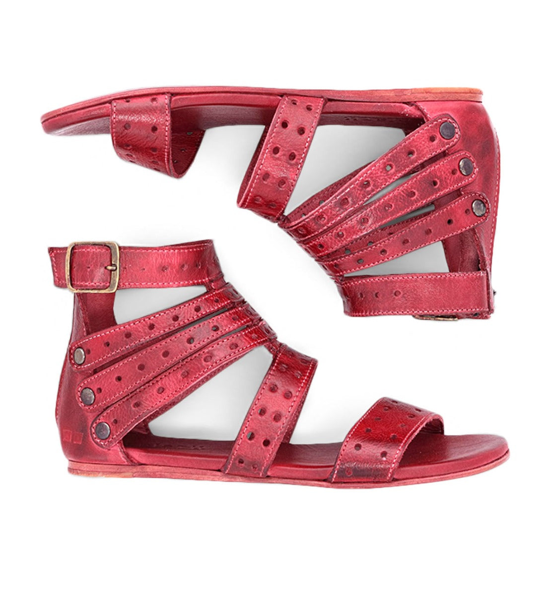 A pair of Bed Stu Artemis M red sandals with straps and buckles.