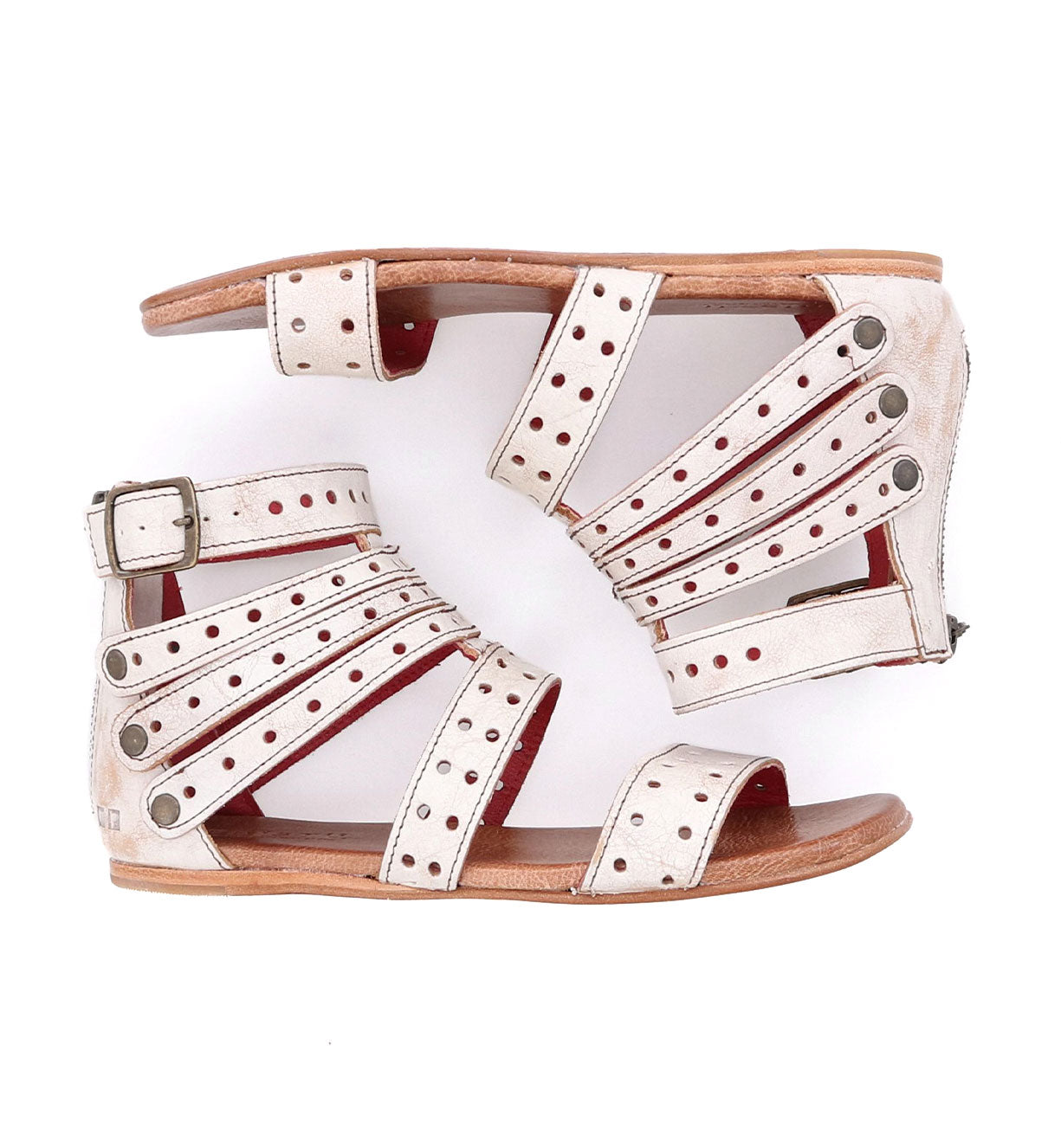 A pair of Bed Stu Artemis M white sandals with straps.