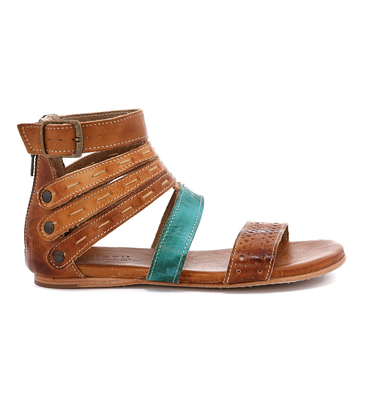 An Artemis sandal by Bed Stu with tan and turquoise straps.