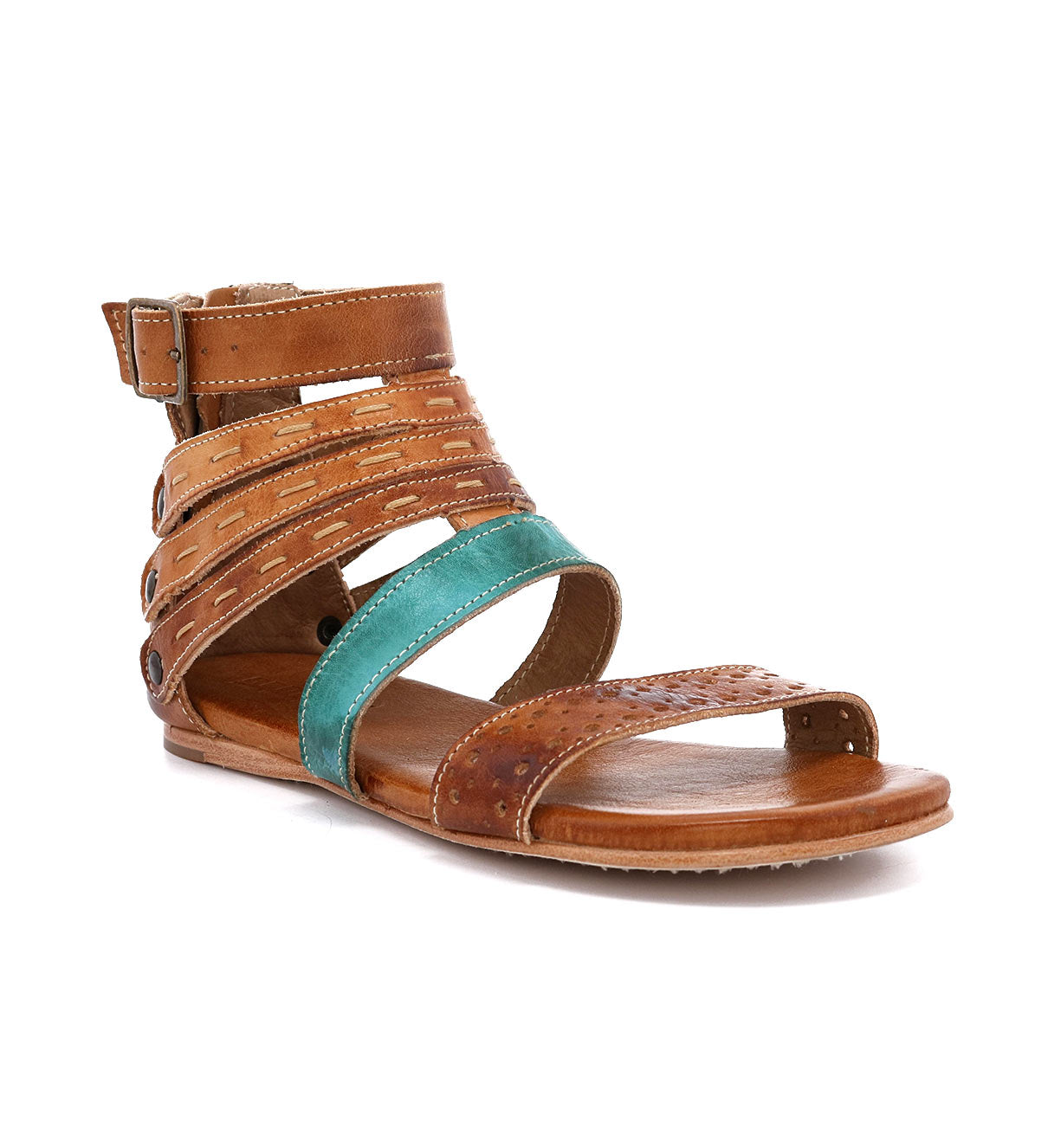 A women's sandal with tan and turquoise straps called Artemis by Bed Stu.