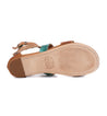 A pair of Bed Stu Artemis women's sandals in teal and green.