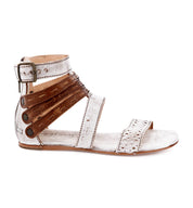 An Artemis sandal with brown straps and buckles by Bed Stu.