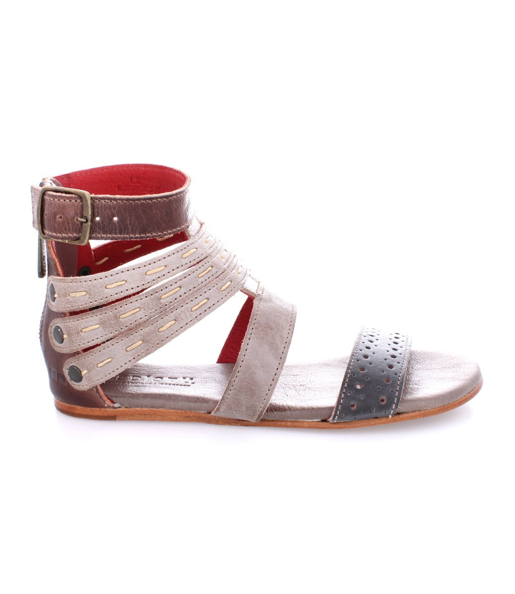 A pair of Bed Stu women's sandals with straps and buckles.