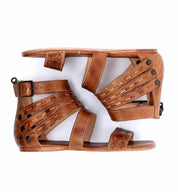 A pair of Bed Stu Artemis sandals with straps and buckles.