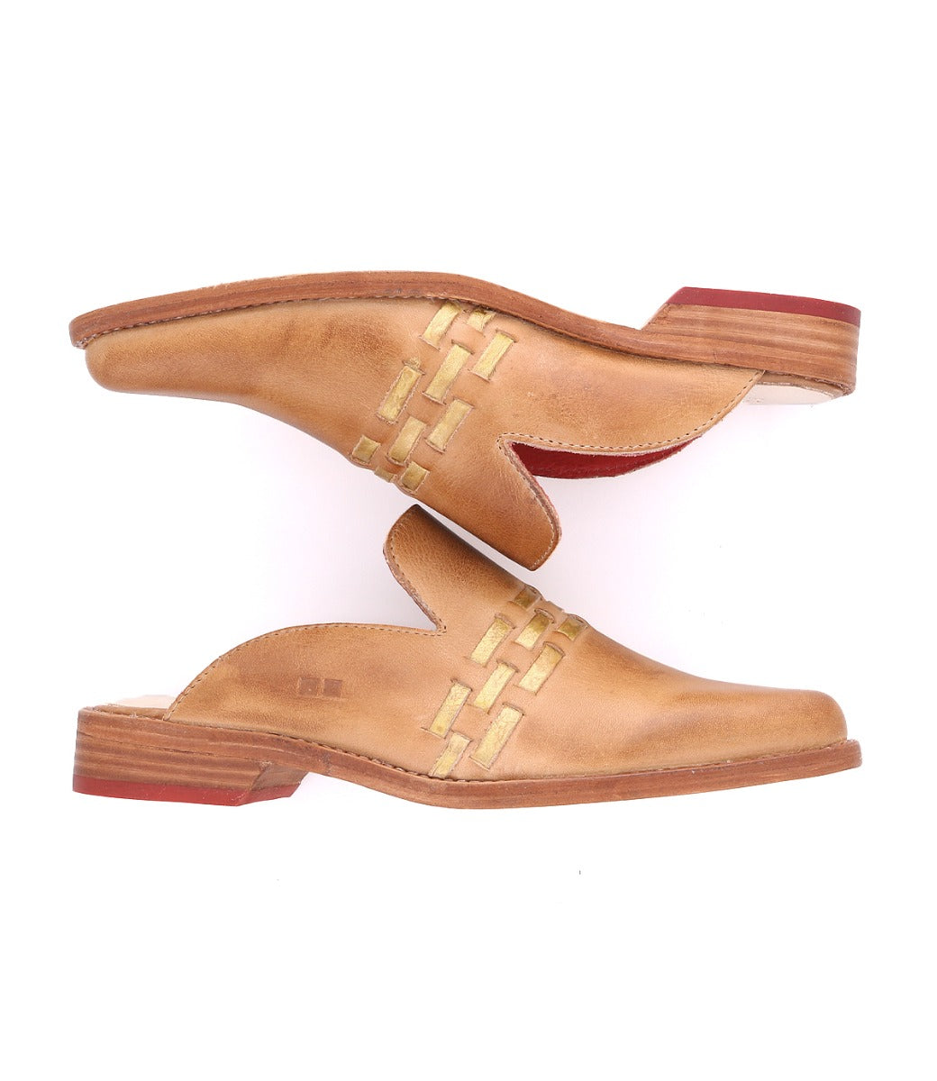 A pair of Asenet leather slippers from Bed Stu.