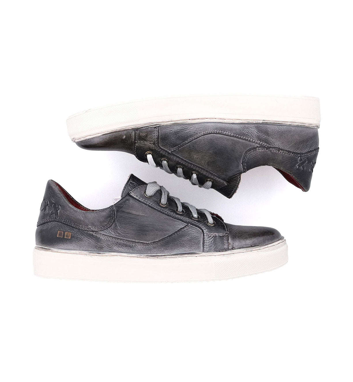A pair of Bed Stu Azeli men's grey leather sneakers.