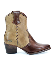 The Baila II Ankle-high cowboy boot by Bed Stu is crafted from two-tone leather, featuring a brown toe and heel with light tan sides, decorative stitching, and a wooden block heel that exudes Western-inspired style.