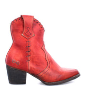 A women's Baila II red cowboy boot with a wooden heel by Bed Stu.