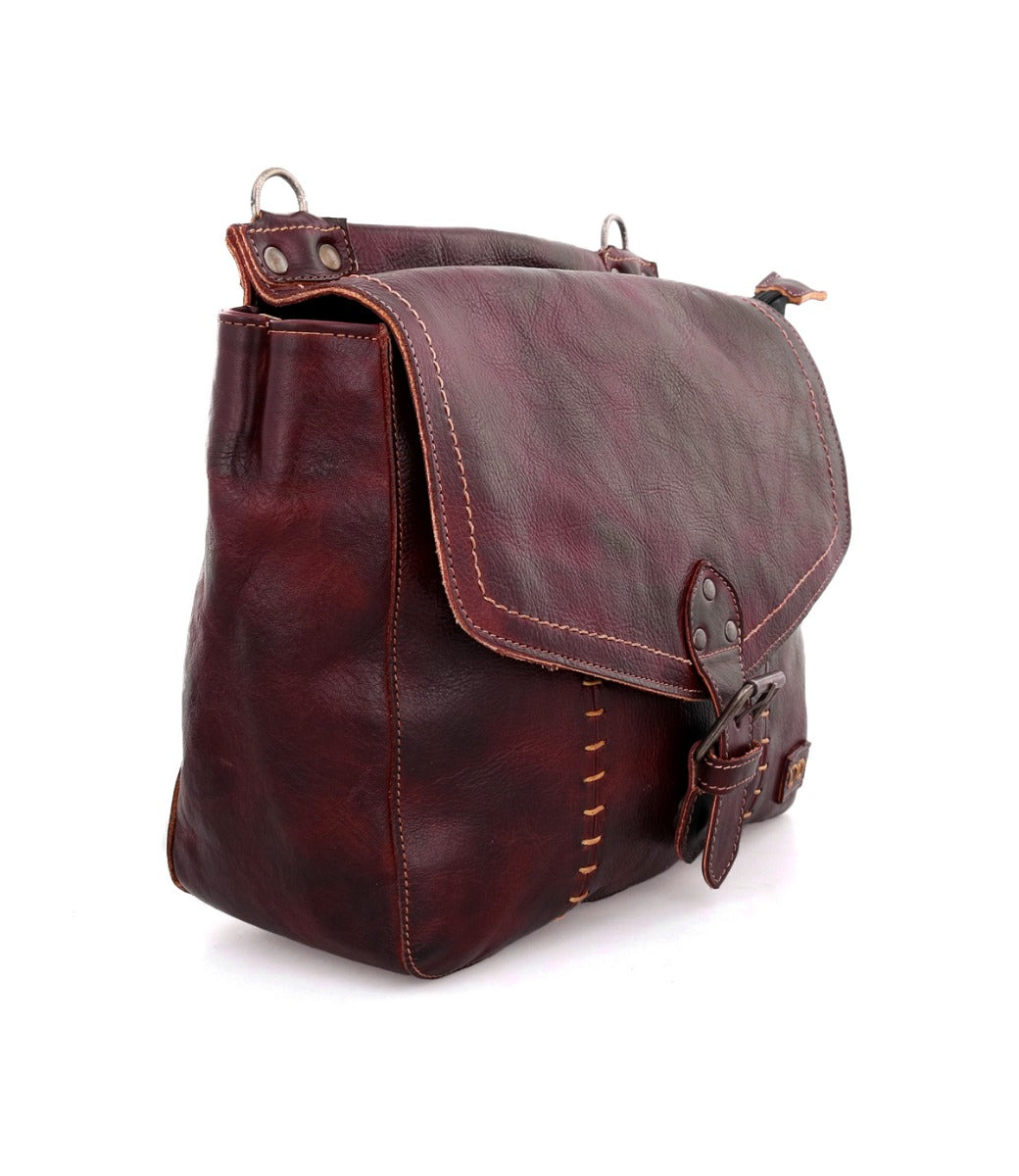 Bathsheba, a bag by Bed Stu, made of burgundy leather, on a white background.