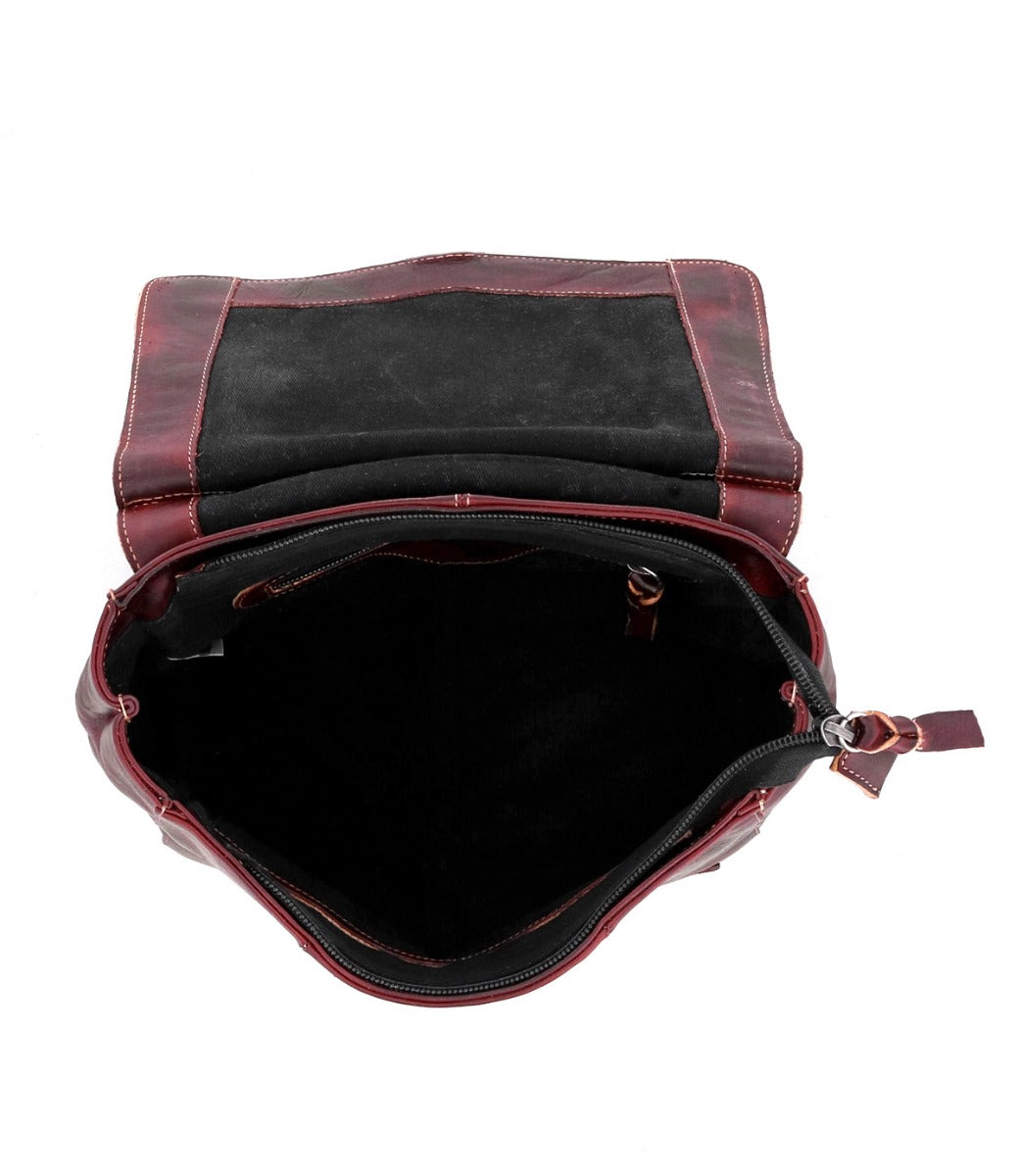 The inside of a Bed Stu Bathsheba burgundy leather bag.
