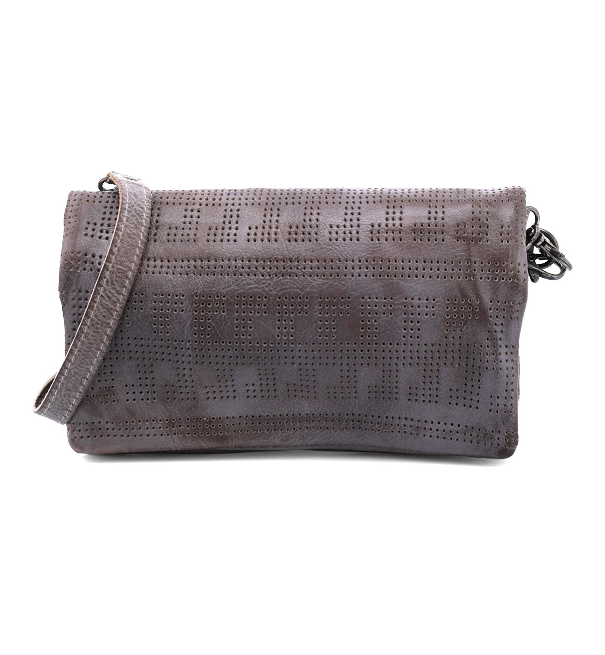 Introducing the Bayshore by Bed|Stü—a versatile gray clutch adorned with a perforated geometric pattern and complemented by a matching strap, shown against a white background. This stylish accessory seamlessly transforms from a travel wallet to a crossbody bag, offering hands-free convenience wherever you go.