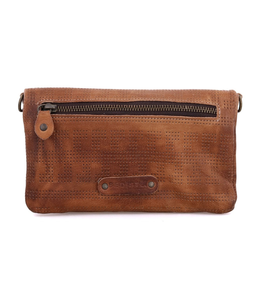 A Bayshore leather clutch bag by Bed Stu with a zipper.