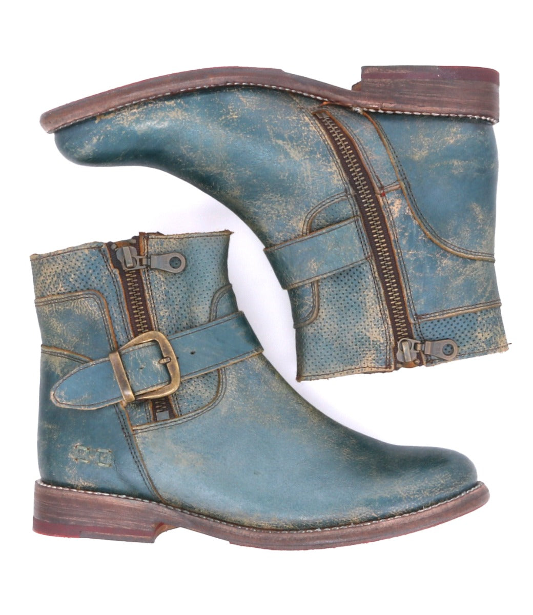 A pair of Becca blue leather boots with buckles by Bed Stu.