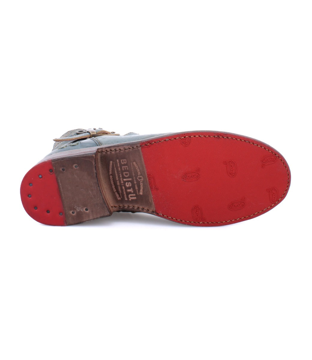 Sole of Becca teal leather boots by Bed Stu.