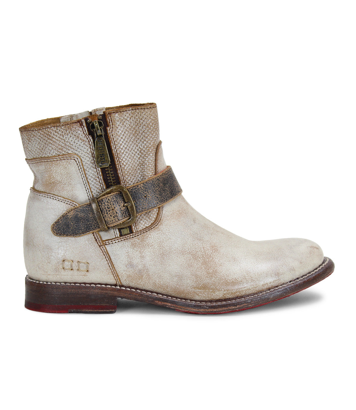 A white leather Becca ankle boot with a buckle on the side from the Bed Stu brand.