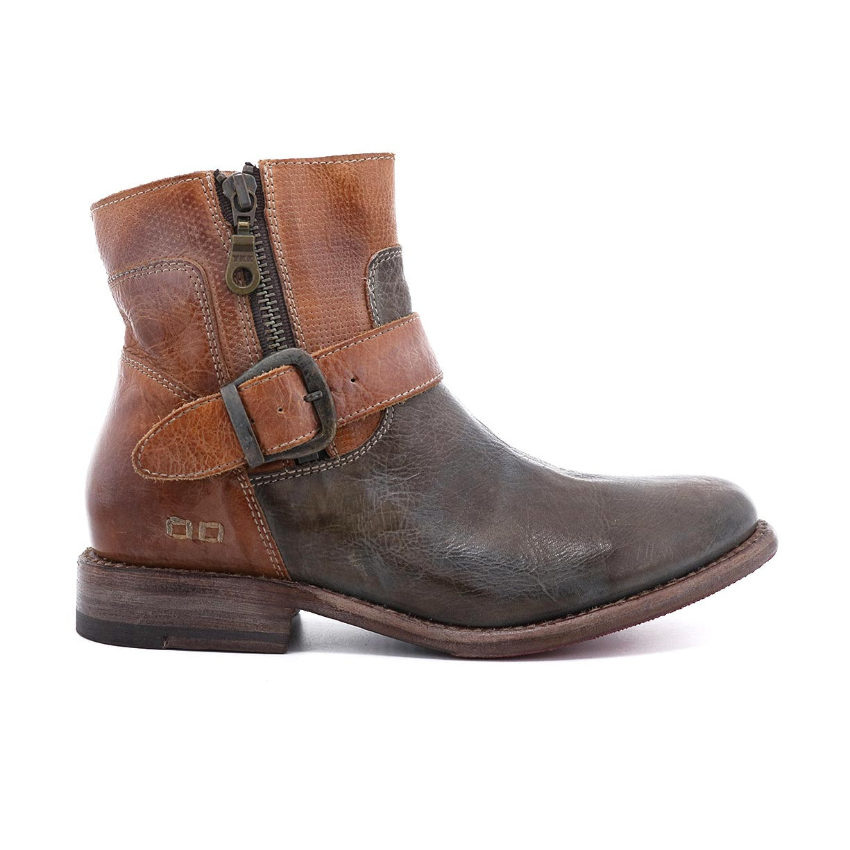 A Becca ankle boot by Bed Stu with a buckle and zipper.