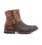 A Becca ankle boot by Bed Stu with a buckle and zipper.
