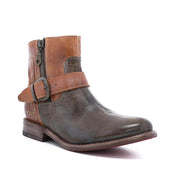A pair of Becca boots by Bed Stu with a buckle on the side.