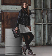 A woman wearing a pair of Bed Stu Becca leather boots.