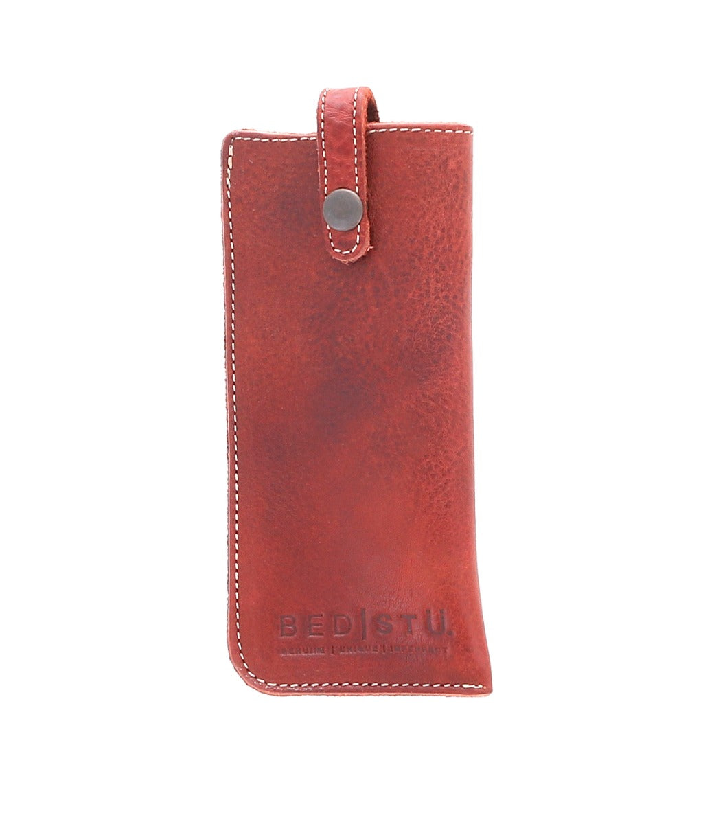 A Behold phone case with a metal clasp. Brand Name: Bed Stu