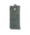 A Behold green leather case with a metal clasp by Bed Stu.