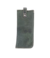A green leather Behold phone case by Bed Stu with a zipper.