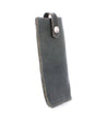 A Behold leather case with a metal clasp by Bed Stu.