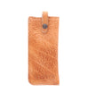 A Behold leather phone case with a metal clasp by Bed Stu.