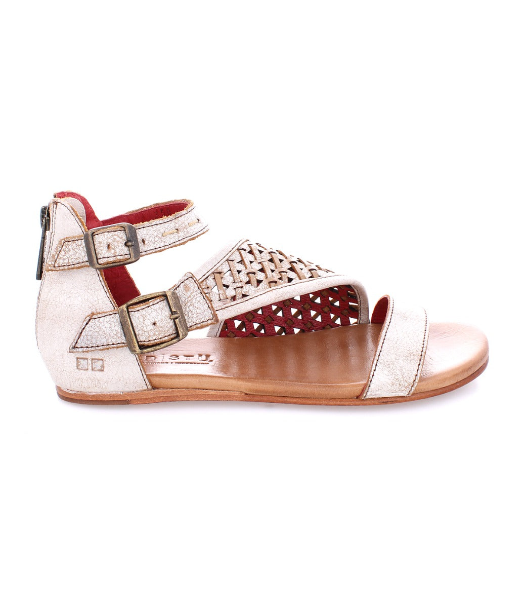 A women's white Bellatrix II sandal with a red strap by Bed Stu.