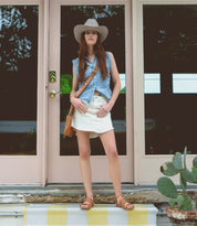 A woman wearing a Bed Stu Bellatrix II sandals.