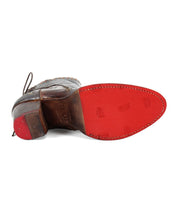 A single Bia leather bootie by Bed Stu featuring a red sole, worn-out heel, and a detailed edge stitching.
