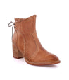 A women's tan ankle Bia boot with a wooden heel by Bed Stu.